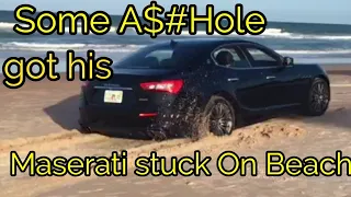 Some A$$hole got his Maserati stuck on the Beach