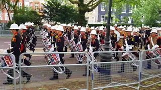 Massed bands of HM royal marines march to beating retreat 2018