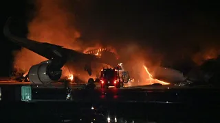 Japão investiga causas de acidente no aeroporto de Haneda | AFP