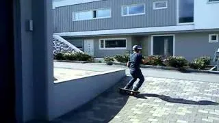 Skateboard down wall