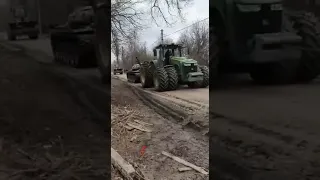 Towing abandoned russian armour
