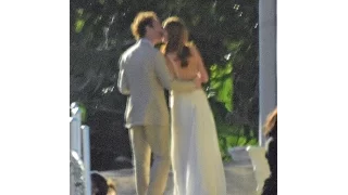 Prince Harry kisses and cuddles Meghan Markle at his close pal's wedding in Jamaica