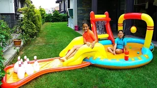 Öykü and Masal Play with Inflatable Water Slide - fun kids