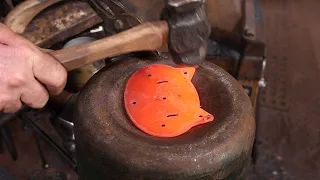 Forging cat head chest handles - Blacksmithing