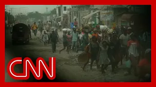 CNN reporter witnesses Haitian gang violence from inside armored car