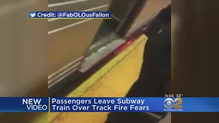 Passengers Exit Subway Train Over Track Fire Fears