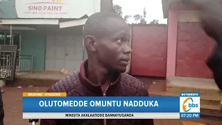 Akabenje Kasse Omu Ku Luguudo Oludda E Jinja, Olutomedde Omuntu Nadduka