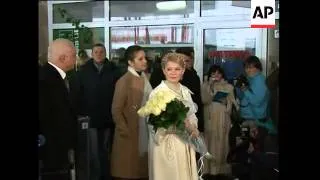 WRAP Yanukovich casts ballot in run-off ADDS Tymoshenko