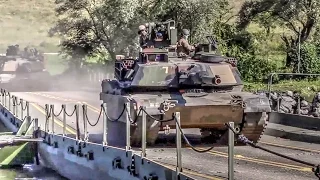 Army Armored Vehicles Conduct Tactical Water Crossing