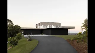 Welcome to Whipbird House, a stunning concrete home situated in Australia.