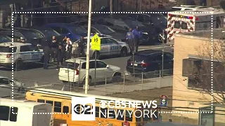 NYPD officers fire on armed suspect in Queens, police say