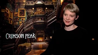 Mia Wasikowska  on Crimson Peak and possibly helping herself to the furniture on set.