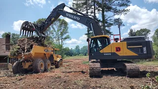 Loading Brush With The Graptor Rake To The Burn Pile