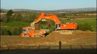 Hitachi Zaxis 870 LCH excavator earthmoving with Hitachi EH1100 dump trucks