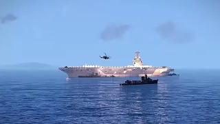 Russian Ka-52 helicopter blew up the largest US aircraft carrier loaded with 300 M270 MLRS rockets