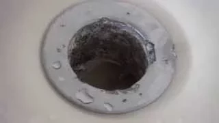 how to remove a corroded bathtub drain