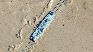 China Has a Fake US Aircraft Carrier on Railroad Tracks in the Desert