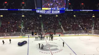 Fan scores puck in net to win a new car