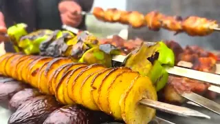 Butchering a Young Lamb for cooking Grill and grill with vegetables over a fire