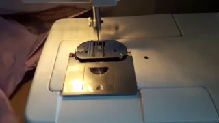 How to wind a bobbin on singer 9113
