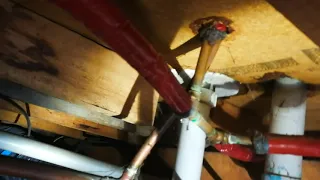 Floor joists cut by plumber