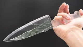 Kitchen knife made by cooking sand in a microwave oven