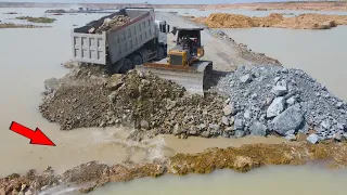 Incredible Build Road In Deep Pit with Techniques Bulldozer Push Stone, Dump Truck Unloading Stone