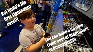 Kai builds his very first custom Lightsaber in Star Traders store at Disneyland Nurses day Adventure