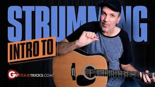 How To Strum Guitar Super Easy For Absolute Beginners | Guitar Tricks
