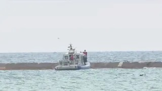 Police search for woman's body after deadly boat wreck on Lake Michigan