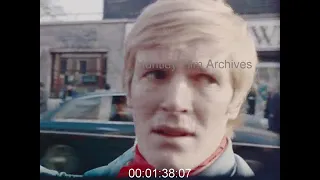 Man Drives Jaguar Down Road, Stares at Women, 1960s - Film 1090559