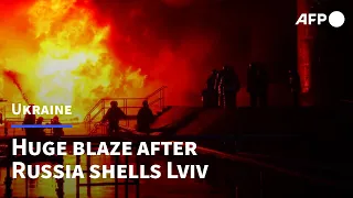 Firefighters battle blaze at fuel storage facility after shelling in Lviv | AFP