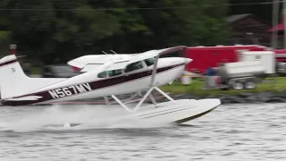 Cessna A185F Skywagon floatplane takes off from Moosehead Lake