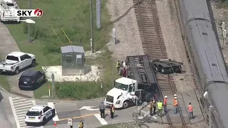 Truck struck by Amtrak train in Longwood, police say