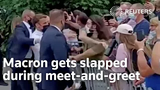 Macron gets slapped during meet-and-greet