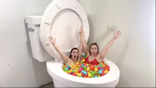 Going UNDERWATER in Worlds Largest Toilet Play Ball Pit in Green Pool with TWIN