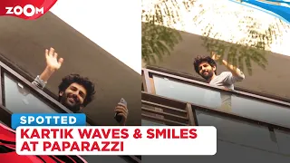 Kartik Aaryan smiles and waves at paparazzi from balcony after exit from Dostana 2