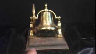 Antique brass pull string doorbell