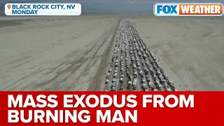 Flood-Stranded Burning Man Revelers Begin Mass Exodus After Monsoon Rains Trapped Festivalgoers