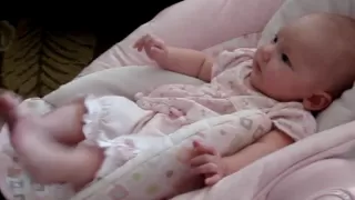 3 month old baby laughing at mom working out
