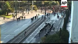 WRAP Clashes between riot police and protesters