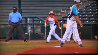 Smart 10-year-old pitcher picks off runner at 1st base.