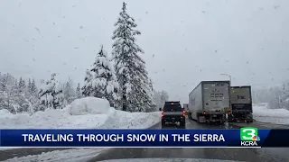 Traffic moved along on Interstate 80 despite more snow in the Sierra