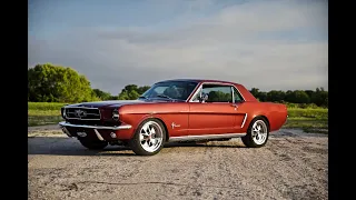 Production Car Review - Vintage Burgundy Metallic Revology 1965 Mustang coupe