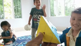 My son solving pyraminx Rubik cube in one minute.😍😍