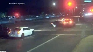 Car runs red light, crashes, narrowly misses family crossing street in Phoenix | ABC7