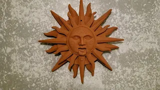 Gemmy Singing Galaxy Sun Plaque (Terracotta)