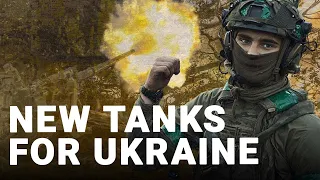 Ukrainian soldiers welcome new jet-powered US Abrams tanks