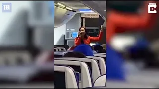 Flight attendant raps safety instructions to delighted passengers