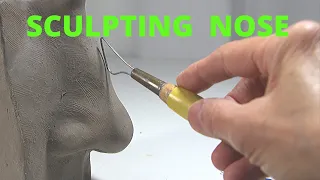Sculpting the nose in clay. Sculpting in a water based clay. Tutorial